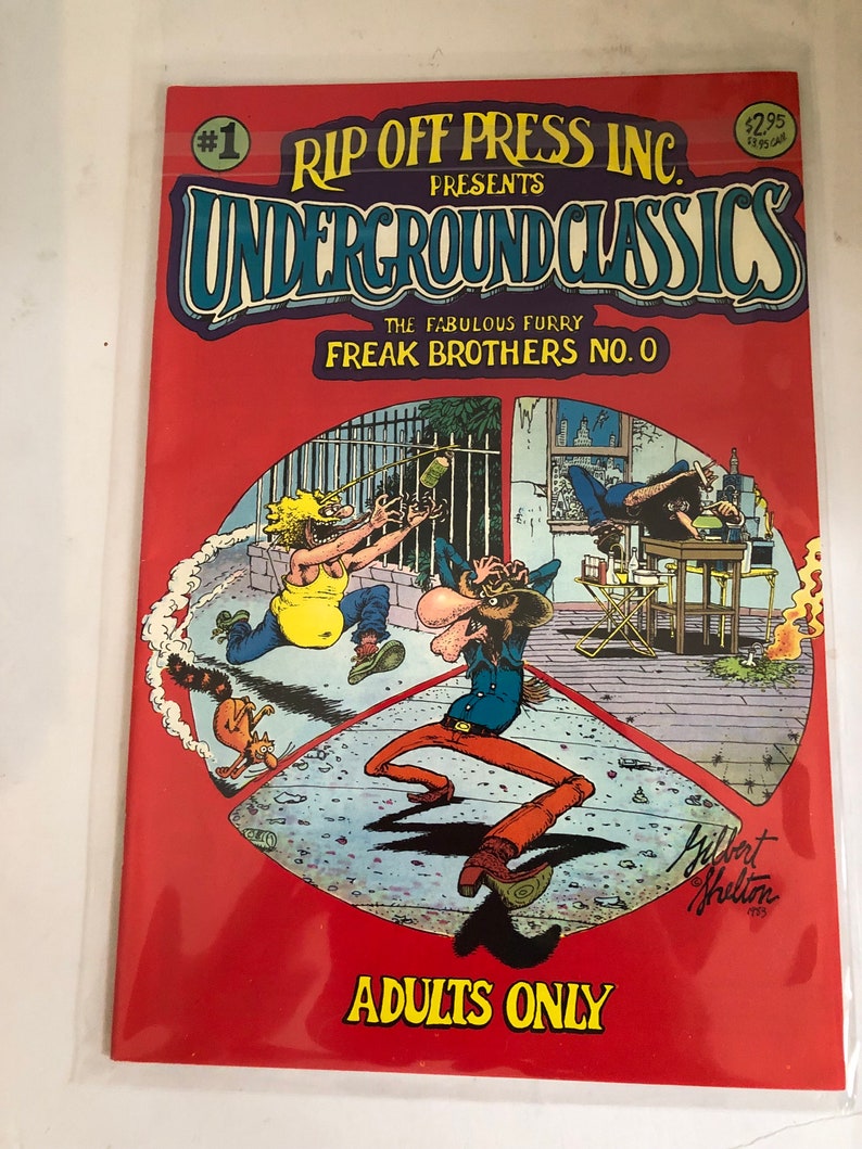 May include: A comic book cover with a red background and the title "Rip Off Press Inc. Presents Underground Classics: The Fabulous Furry Freak Brothers No. 0". The cover features a cartoon illustration of three characters in a city setting. The comic book is labeled "Adults Only".