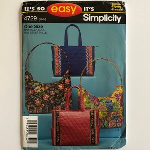 May include: Simplicity sewing pattern 4729 for a one-size tote bag. The pattern shows three different tote bags with various fabric designs. The bags are blue, red, and black with floral and owl patterns.