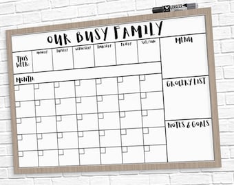 May include: White dry-erase board with a black frame. The board is divided into sections for "This Week", "Month", "Menu", "Grocery List", and "Notes & Goals".