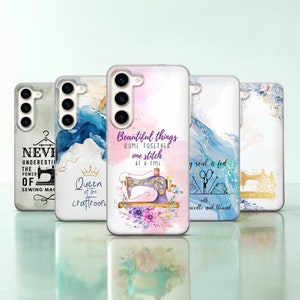 May include: Five different phone cases with watercolour backgrounds and sewing machine designs. The cases feature quotes about sewing, such as "Never underestimate the power of sewing machines" and "Beautiful things come together one stitch at a time".