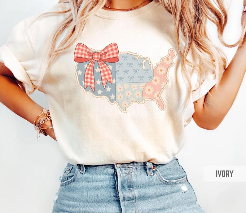 a woman wearing a t - shirt with a bow on it