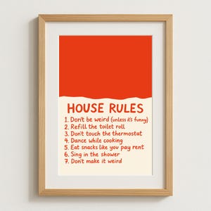 May include: Wooden framed print with a red upper section and a cream lower section. The text "HOUSE RULES" is above a list of seven rules, including "Don't be weird" and "Refill the toilet roll."