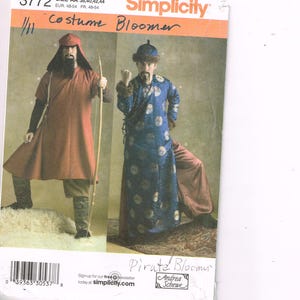 May include: Simplicity pattern for a costume bloomer. The pattern features two costume designs: one in red with a hat and bow, and another in blue with a fur-trimmed hat. The text "Costume Bloomer" and "Pirate Bloomer" are visible.