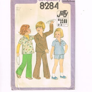May include: Vintage Simplicity sewing pattern 8284 for children's clothing. The pattern features illustrations of three children wearing different outfits, including a shirt and pants, a jumpsuit, and a striped shorts set. The pattern is labeled "Jiffy" and includes the size 6.