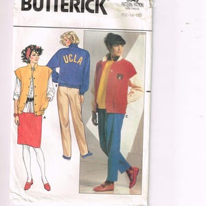 May include: Butterick pattern 3349 featuring illustrations of three different outfits. The outfits include a yellow vest, a blue UCLA sweatshirt, and a red and yellow jacket. The pattern size is 12-14-16.