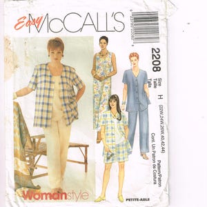 May include: A vintage McCall's sewing pattern titled "Easy McCall's" featuring multiple women's fashion designs. The pattern includes a variety of styles, including a plaid jacket and shorts set, a floral print dress, and a denim pantsuit. The pattern size is H (22W-44).