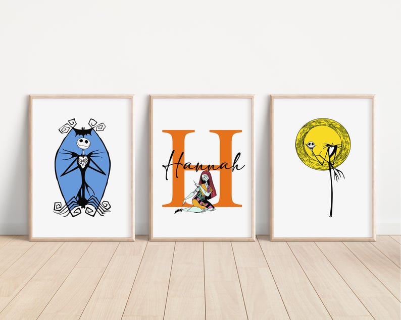 May include: Three framed prints featuring characters from the Nightmare Before Christmas. The first print shows Jack Skellington in a blue oval with a black heart. The second print shows Sally sitting in a large orange letter H with the name "Hannah" above her. The third print shows Jack Skellington in a yellow circle with a black heart.