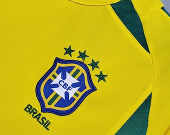 ★GRAILZ★ HEART EMBLEM RETRO JERSEY BRASIL YELLOW MUSINSA | GRAILZ HEART EMBLEM RETRO JERSEY [BRASIL YELLOW]