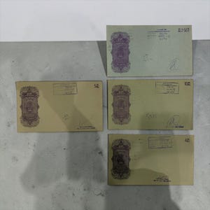 May include: Five rectangular Indian revenue stamp documents in shades of light green and tan. Each features a purple ornate border, a central emblem, and handwritten ink notations. Denominations include 2.50, 5, 10, and 4 rupees printed in the corners.