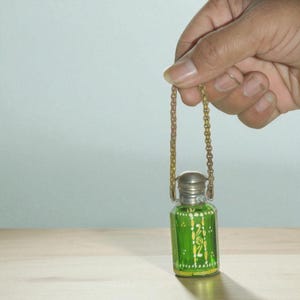 Vintage Green Glass Perfume Bottle with Brass Cap and Chain, Antique Pocket Scent Bottle, Collectible Art Deco Style small glass ittar