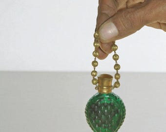アンティークのウランガラス製楕円形香水瓶 - Etsy 日本