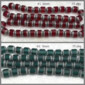 May include: Close-up of two strands of 6mm beads. One strand features red beads with silver-colored accents, and the other features green beads with silver-colored accents. The text "#1. 6mm" and "#2. 6mm" is visible.