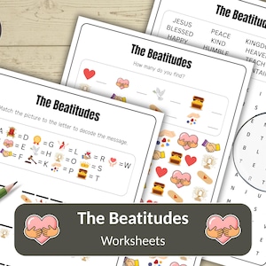 May include: A collection of white worksheets titled "The Beatitudes" with various activities, including a word search and a picture-to-letter matching game. The worksheets feature hearts, hands, and other illustrations. A green pencil is visible.