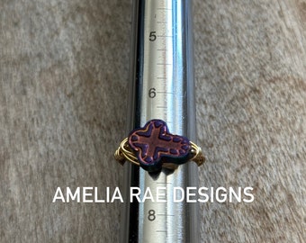 Purple cross ring