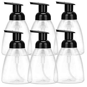 May include: Six clear plastic foaming soap dispensers with black pump tops. The bottles have a rounded, bell-shaped design. The pump tops have a lever for dispensing the soap. The dispensers are empty.