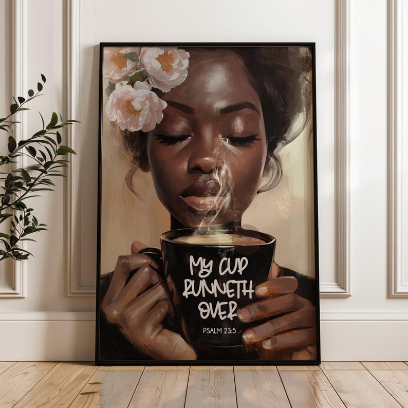 May include: Framed art print featuring a portrait of a woman with closed eyes, holding a black mug with steam rising. The mug has the text "My Cup Runneth Over" and "Psalm 23:5". The woman has flowers in her hair.