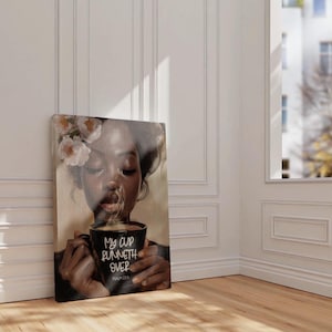 May include: A canvas print featuring a portrait of a person with closed eyes, holding a black mug with the text "My Cup Runneth Over" and the Bible verse Psalm 23:5. The person has flowers in their hair.
