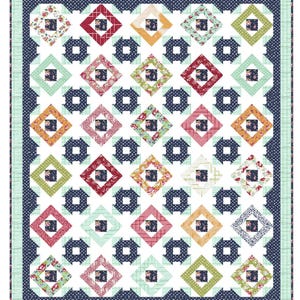 May include: A quilt with a white background and a pattern of blue, red, green, and yellow squares. The squares are arranged in a geometric pattern and are surrounded by a blue border.