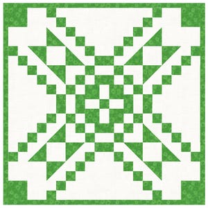 May include: A green and white quilt block with a starburst pattern. The block is made up of squares and triangles.