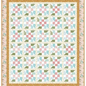 May include: A colorful quilt with a repeating pattern of squares and triangles in shades of pink, blue, green, and white. The quilt has a floral border in pink and gold, and a gold inner border. The quilt is a patchwork design.