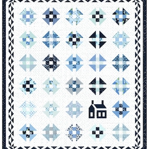 May include: A handmade quilt featuring a repeating pattern of blue and white geometric shapes. The quilt has a white background with small gray dots, a navy blue border, and a house silhouette in the center. The quilt is approximately 80 x 90 inches.