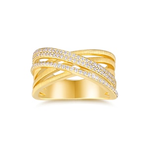 May include: A gold-colored ring with a crisscross design. The ring features multiple bands, some adorned with small, sparkling stones. The ring has a textured finish and a wide band design, suitable for everyday wear or special occasions.