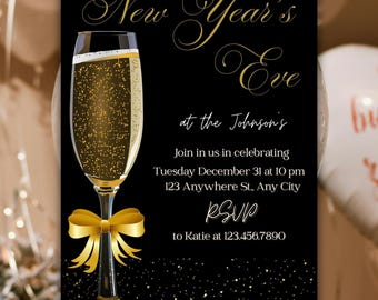 May include: Black and gold New Year's Eve invitation. Features a champagne flute with a gold bow, filled with bubbly liquid. The invitation includes event details and RSVP information in elegant script.