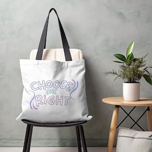 May include: White tote bag with black handles and the text "Choose the Right" in a colorful, stylized font.