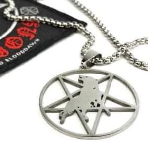 May include: A silver pendant necklace with a wolf inside a pentagram design. Beside it is a black patch with the word "LEGION" in red and white, and a wolf inside a star. The chain is silver.
