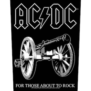 Puede incluir: Gráfico en blanco y negro con el logotipo de la banda AC/DC sobre un cañón. El texto "FOR THOSE ABOUT TO ROCK" está debajo del cañón. La imagen es una ilustración estilizada.