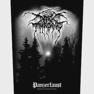 May include: A black and white rectangular fabric patch featuring the Darkthrone logo in a jagged, stylised font at the top with a pentagram. Below, a dark forest silhouette is set against a bright moon. The word Panzerfaust is printed at the bottom.