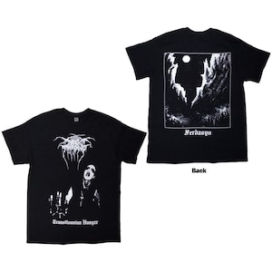 May include: Black t-shirts featuring gothic-style graphics. One shirt displays a band logo and the text "Transilvanian Hunger" with a figure. The other shirt has a landscape design with the text "Ferdasyn" and the word "Back".