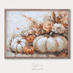 May include: A framed painting of a still life featuring white pumpkins, a small orange pumpkin, and a bouquet of white and orange flowers. The background is a light beige with a textured look.