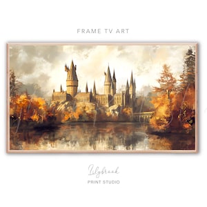 May include: A painting of a large, stone castle with towers and a moat. The castle is surrounded by trees with autumn leaves. The sky is a soft blue with white clouds.
