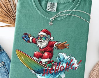 Santa Surfing Christmas T-Shirt: Beach Holiday Tee - Comfort Colors®