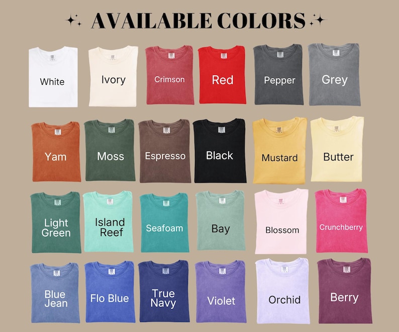 May include: A color chart displaying twenty-four folded t-shirts in various shades including white, ivory, crimson, red, pepper, grey, yam, moss, espresso, black, mustard, butter, light green, island reef, seafoam, bay, blossom, crunchberry, blue jean, flo blue, true navy, violet, orchid, and berry.
