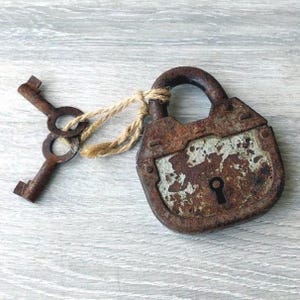 Vintage Rusty Padlock with Two Keys: Heavy Metal Collectible