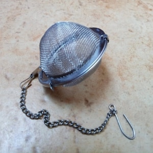 Vintage Mesh Tea Ball Infuser with Chain and Hook, Stainless Steel Tea Strainer for Loose Leaf Tea, Retro Kitchen Tool, Circa 1980s