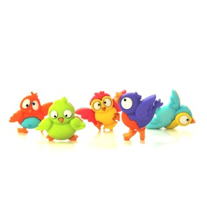 May include: Five colorful cartoon bird figurines with large eyes. The birds are made of plastic and are in various colors, including red, orange, yellow, green, and blue.
