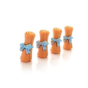 May include: Four orange scroll-shaped decorations with blue ribbon bows. The scrolls are arranged in a row from left to right.
