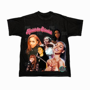 May include: Black t-shirt with a graphic print of Mariah Carey with the text "Mariah the Scientist" in pink.