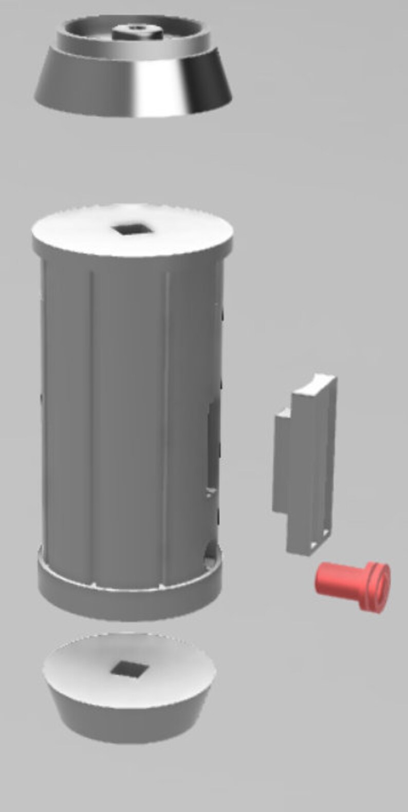May include: A disassembled gray plastic container with a red plastic cap. The container has a cylindrical shape with a flat top and bottom. The cap is a small, round piece with a hole in the center.