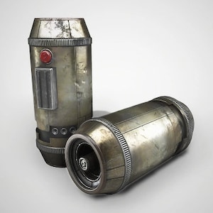 Pode incluir: Dois objetos cilíndricos de cor cinza metálico com um botão vermelho e um pequeno ventilador em uma extremidade. Os objetos têm um aspecto desgastado e industrial.