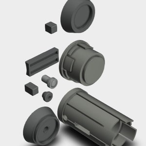 May include: A disassembled set of gray plastic parts for a 3D printed model. The parts include a cylinder, a round cap, a square block, and a rectangular piece.