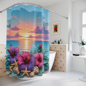 May include: A shower curtain featuring a tropical beach scene with a sunset over the ocean. The curtain has large pink and purple hibiscus flowers, starfish, and seashells. The sky is a mix of blue, orange, and pink.