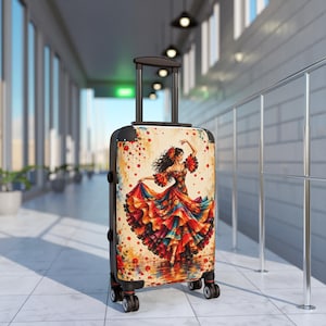 May include: A black rolling suitcase featuring a vibrant, artistic print of a dancer in a multi-colored, ruffled dress with red, orange, and blue hues. The luggage has a retractable handle, four wheels, and a cream-colored background with red floral accents.