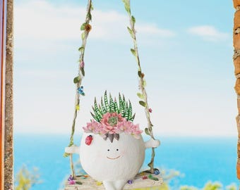 Maceta colgante de resina con forma de niño sonriente en columpio con flores y mariposas para suculentas, regalo ideal para decorar el jardín.