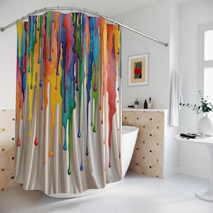 May include: A colorful shower curtain with a vibrant design. The curtain features vertical streaks of paint in various colors, including red, orange, yellow, green, and blue, creating a dripping effect. The background is a neutral beige.