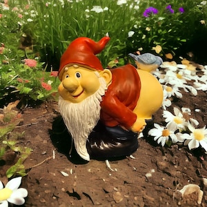 May include: A whimsical garden gnome statue with a red hat and a white beard, holding a small bird on its back. The gnome is made of resin and has a playful expression on its face.