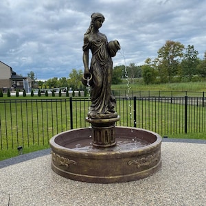 Complete Concrete Fountain Set – Fully Functional with Motor, Built-in pipes, Statue, Base, and Basin

Transform your outdoor space with our stunning concrete fountain set, featuring everything you need for a fully functional water feature. This set includes a basin, a beautifully detailed statue, a sturdy Roman-style base, a fountain nozzle, and a motor—delivering both elegance and functionality.